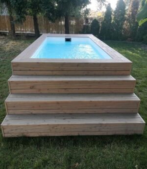 090CE682-5C4C-442F-8100-2CDC56D97340.jpg PISCINA CONTENEDOR CON REVESTIMIENTO DE MADERA
