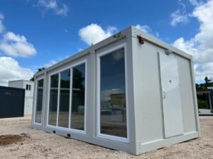 FFC9D326-B932-44A2-B3A6-CD35333F5503.jpg CONTENEDOR DE OFICINA MODELO CASA DE CRISTAL